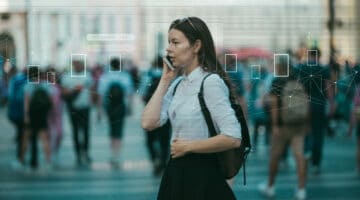 Person talking on a cellphone.